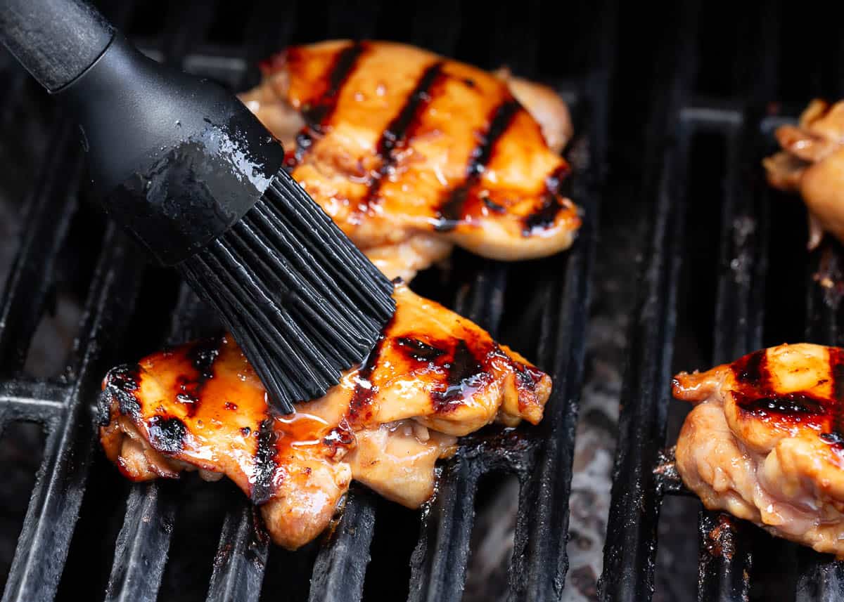 Grilling huli huli chicken on the grill.