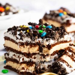 A slice of ice cream sandwich cake on a plate.