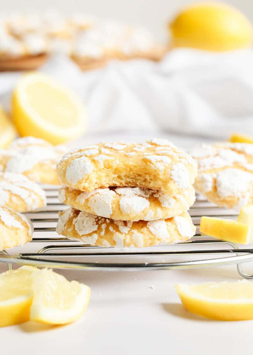 A stack of three lemon crinkle cookies.