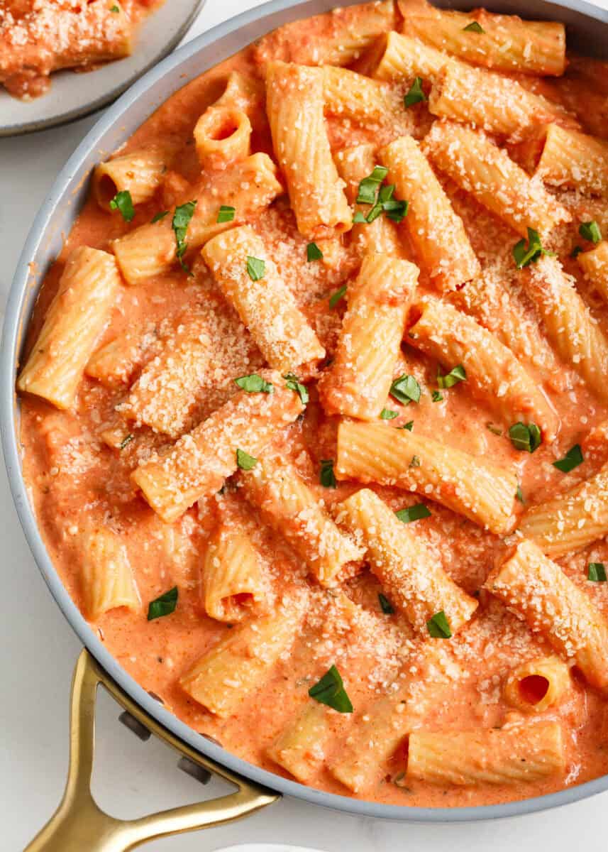 Pink sauce pasta in a skillet.