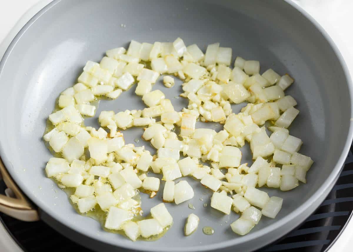 Onions and garlic in a skillet.