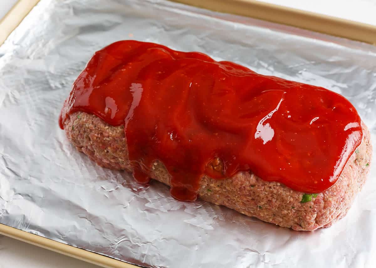 Sheet pan meatloaf on a baking sheet.