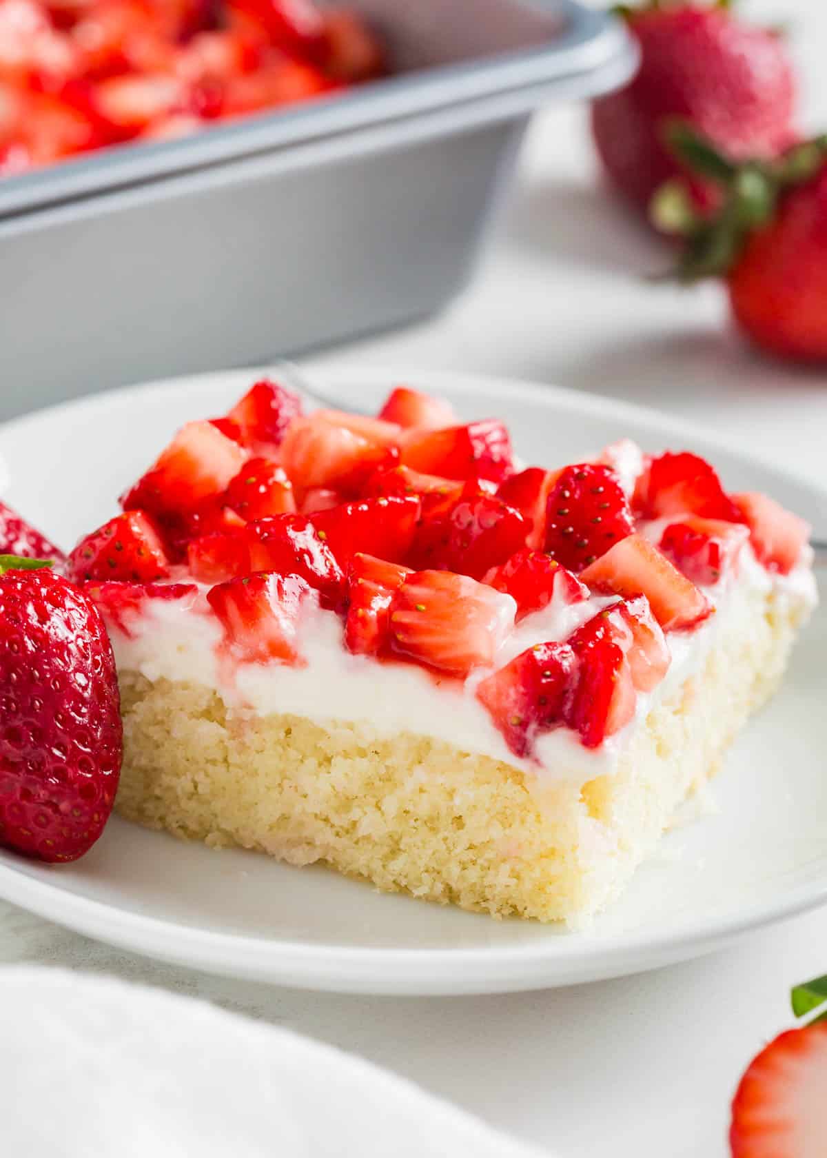 Strawberry shortcake bars on a plate.