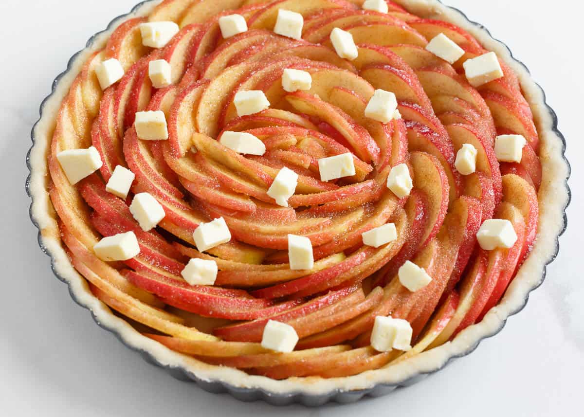 Apple tart with butter on top.