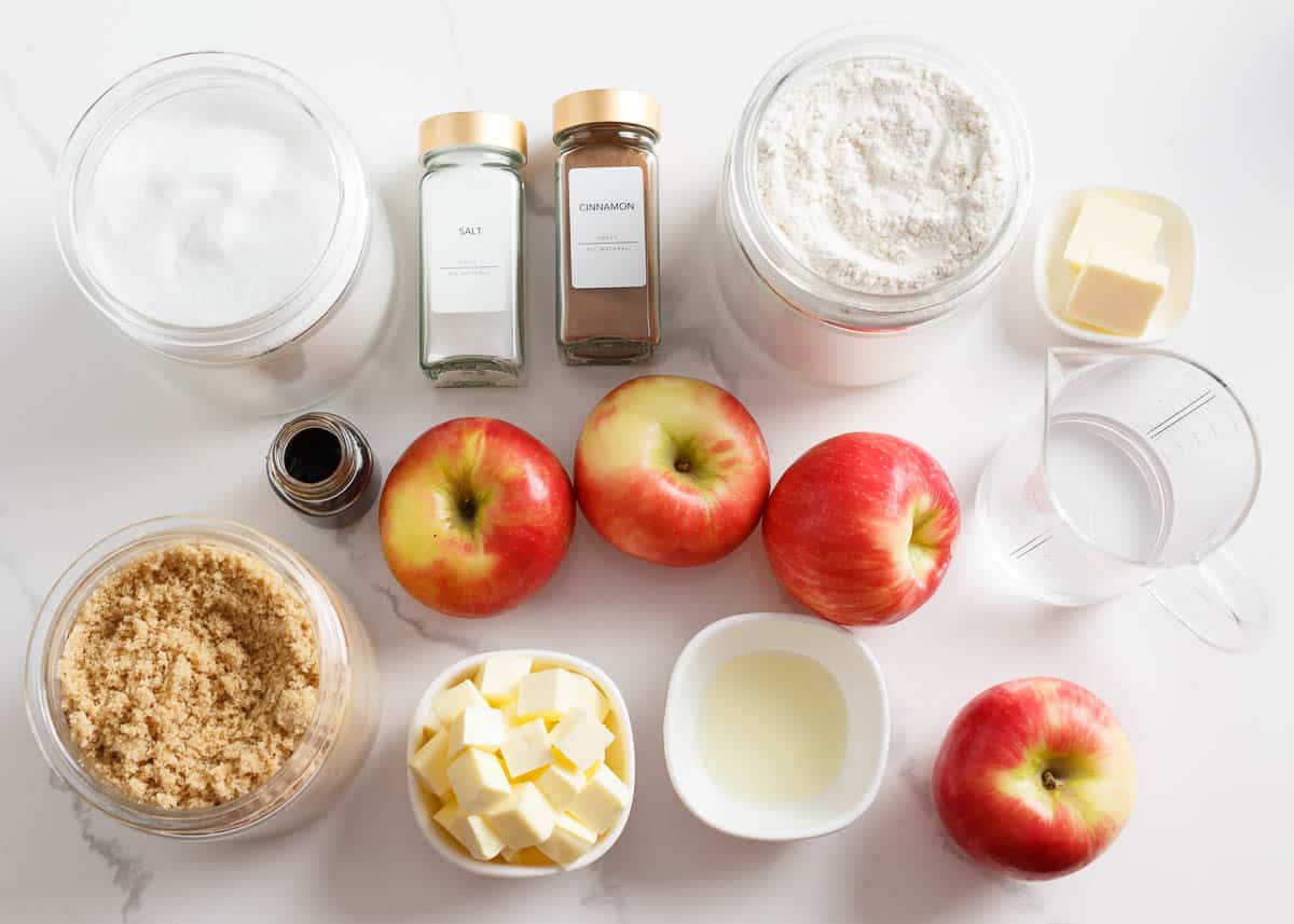 Apple tart ingredients on the counter.