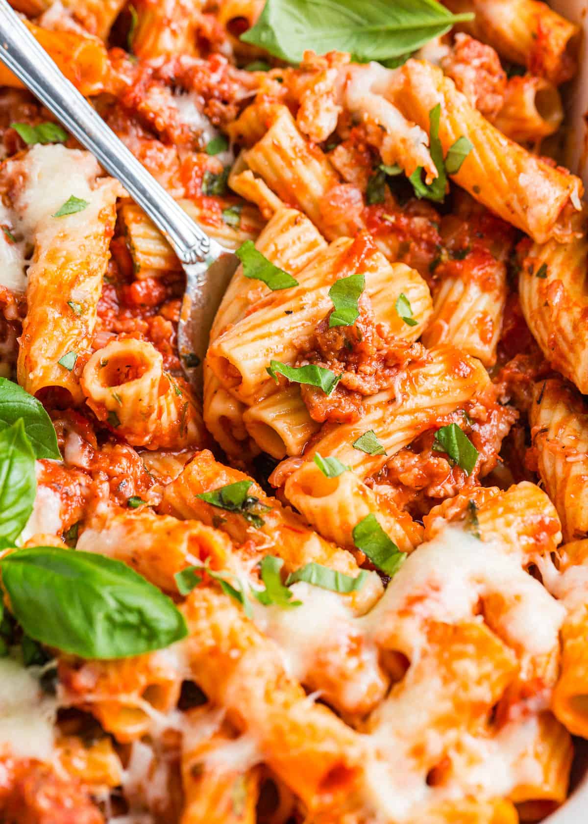 Baked rigatoni with basil.