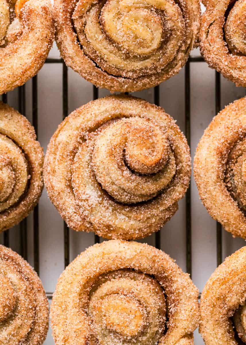 Cruffins on a cooling rack.