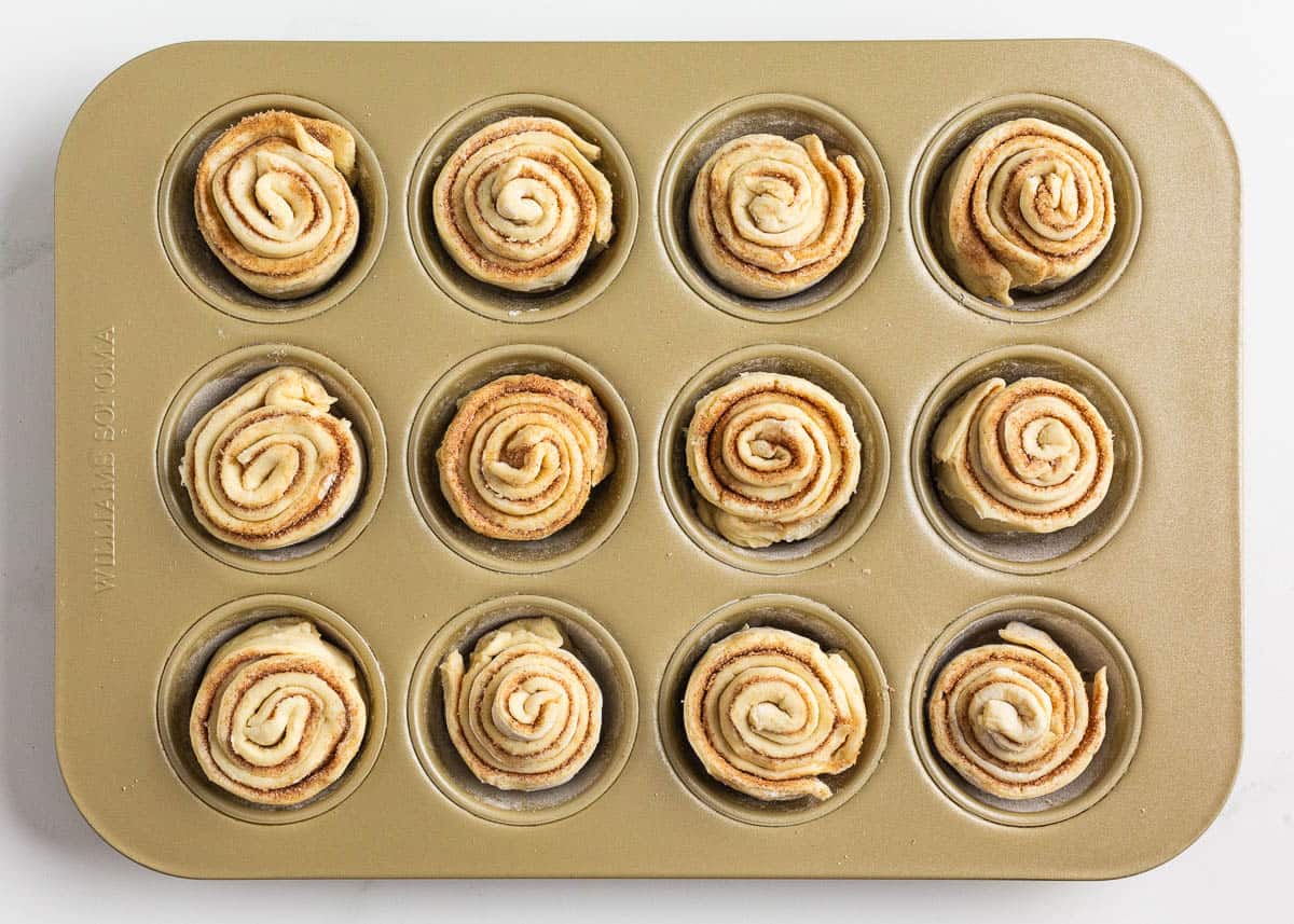 Cruffins in a muffin pan.