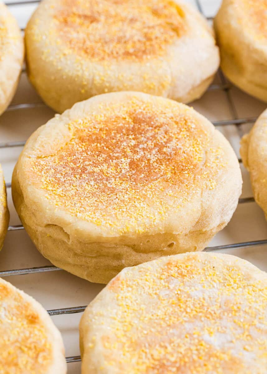 English muffins on a cooling rack.