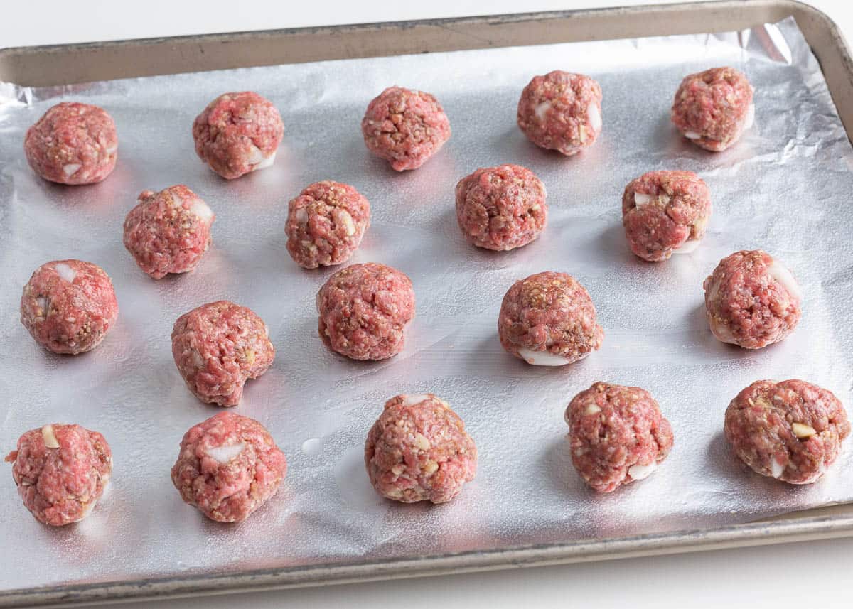 Firecracker meatballs on a baking sheet.