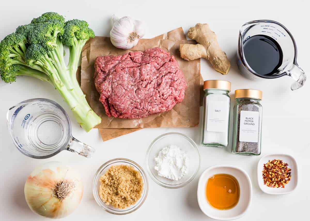 Ground beef and broccoli ingredients on the counter.