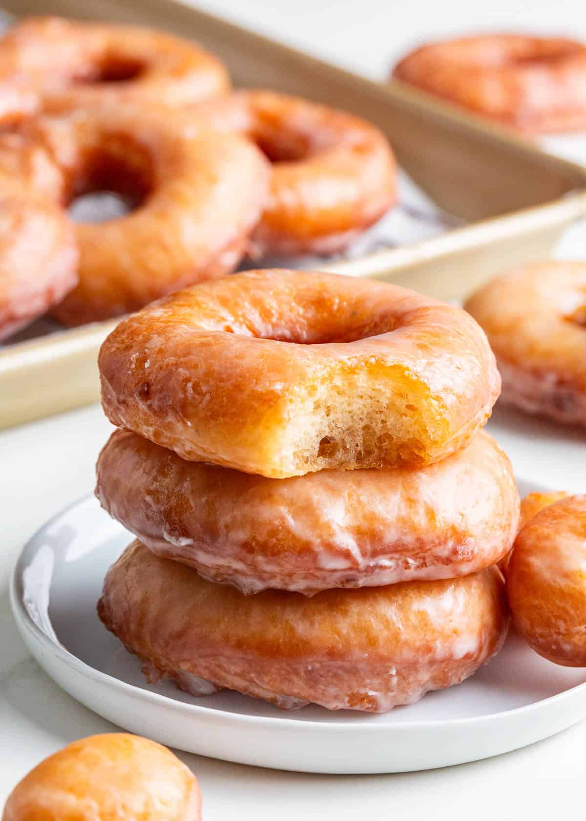 Stack of homemade donuts.