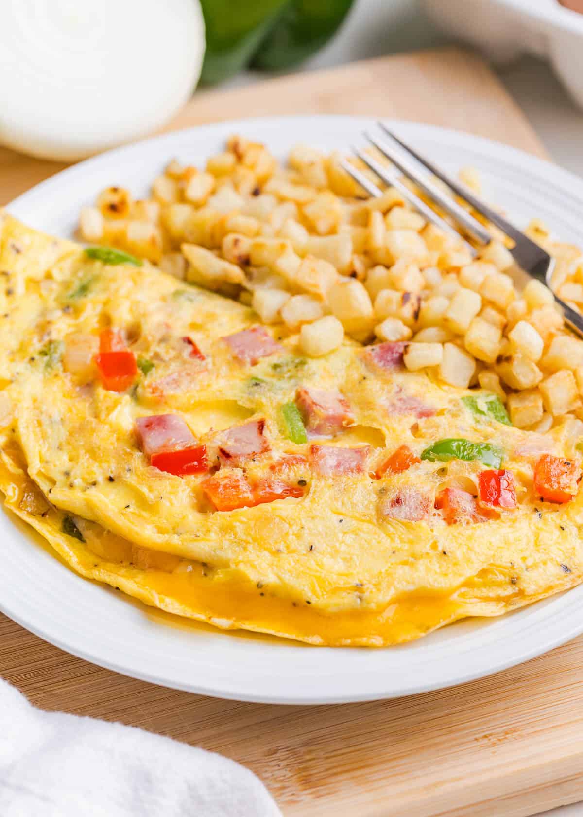 Western omelette on a plate.