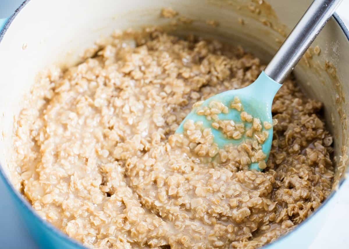 Showing how to make no bake peanut butter oatmeal cookies.