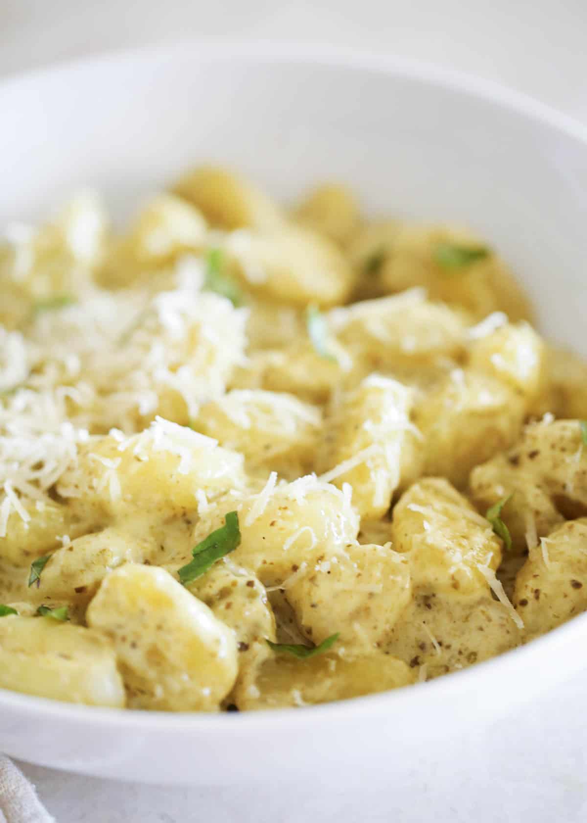 Pesto gnocchi in a bowl.