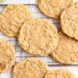 Coconut cookies on a cooling rack.