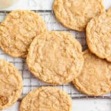 Coconut cookies on a cooling rack.