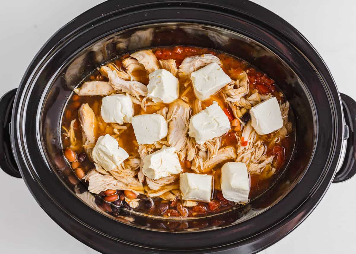 Crack chicken soup with cream cheese in a crockpot.