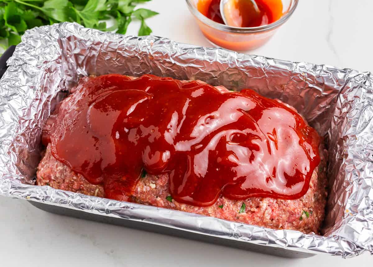 Showing how to make lipton onion soup meatloaf with sauce.