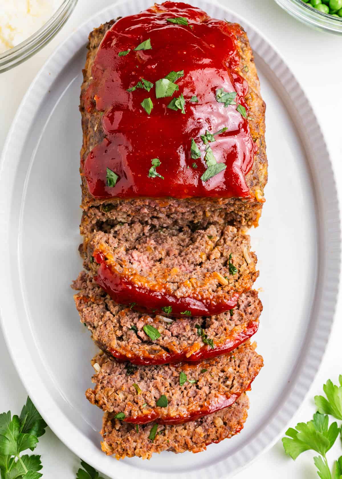 Sliced lipton onion soup meatloaf on a platter.