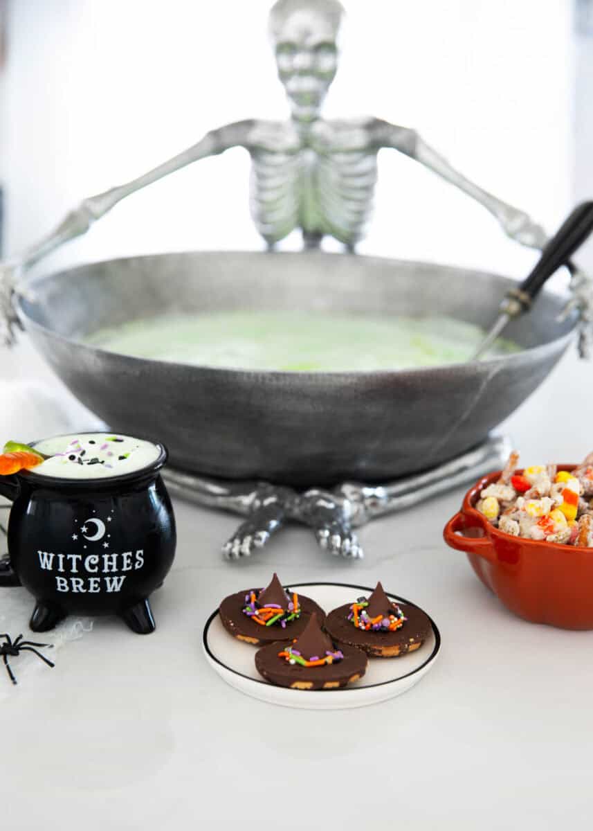 Witches brew in skeleton Halloween punch bowl.