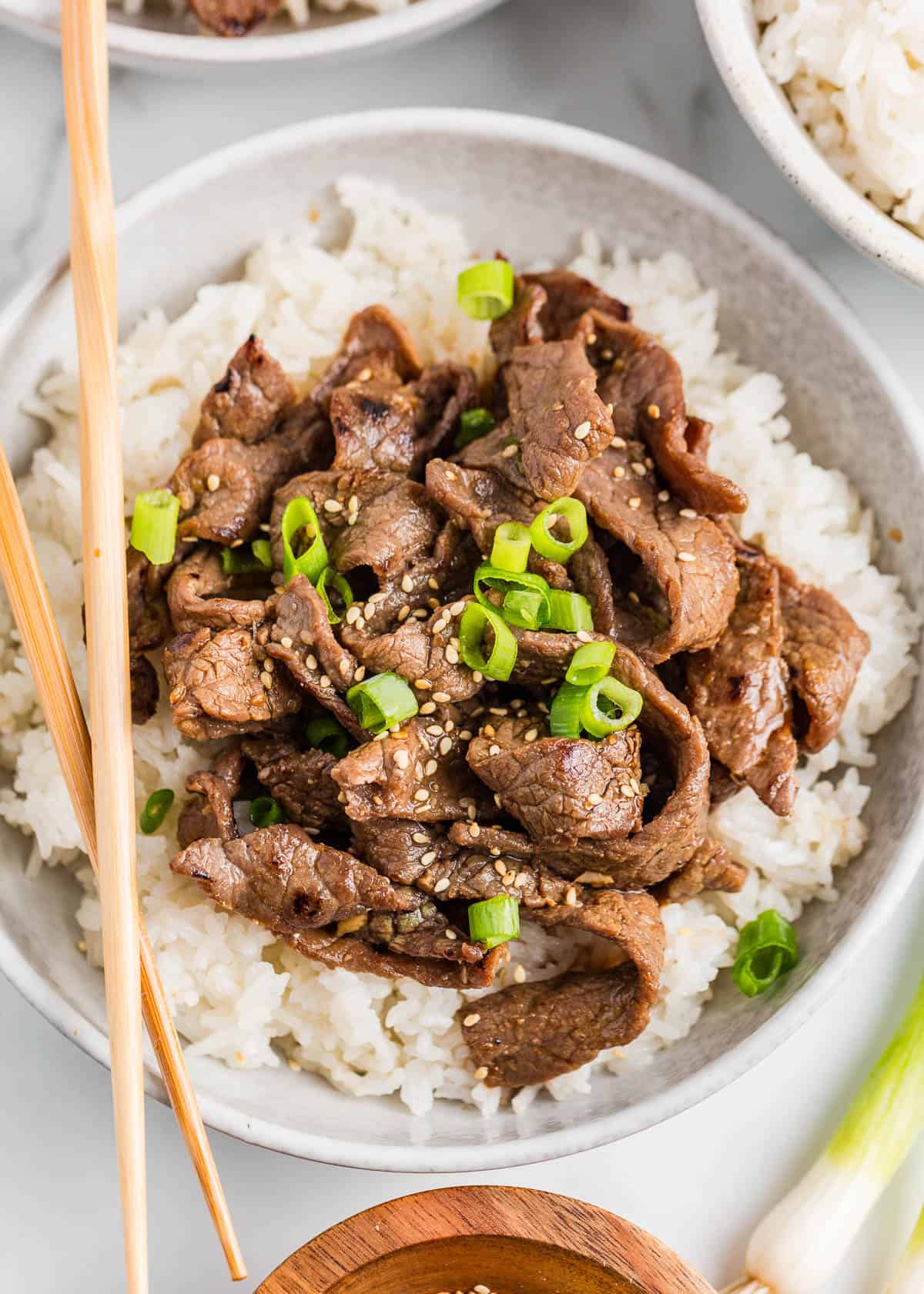 Beef bulgogi and rice in a bowl.