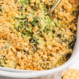 Broccoli cheese casserole in a baking dish.