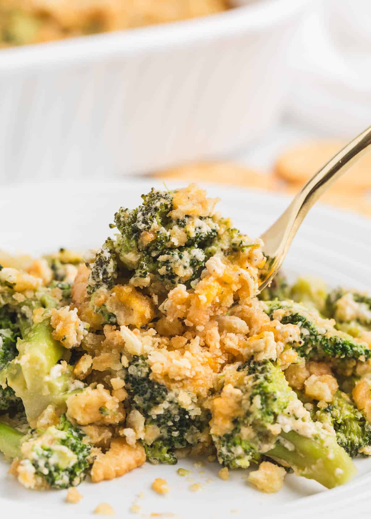 Broccoli cheese casserole on a plate.