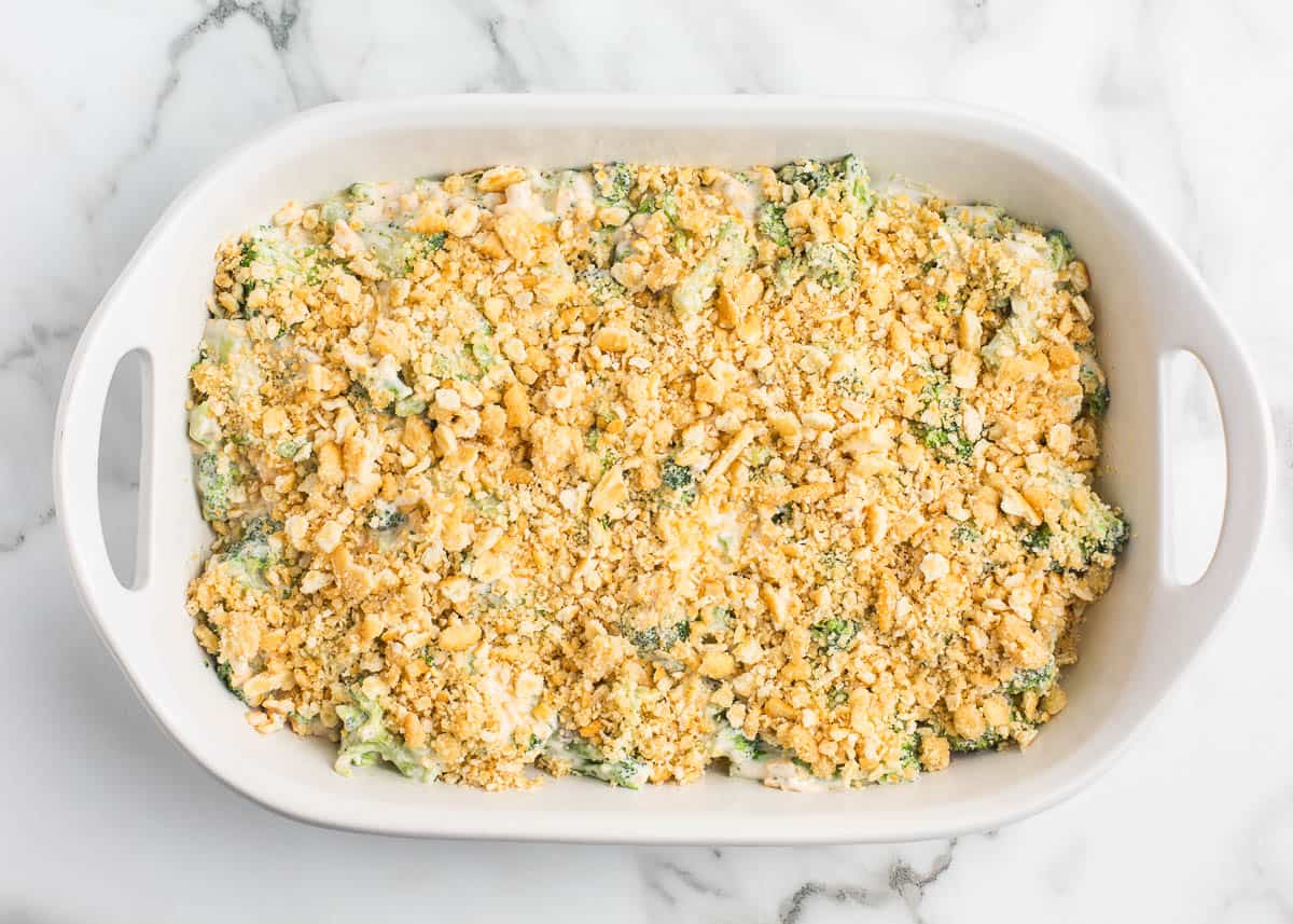 Showing how to make broccoli cheese casserole.