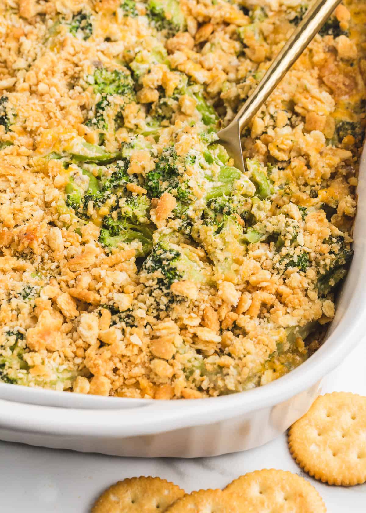 Broccoli cheese casserole in a baking dish.