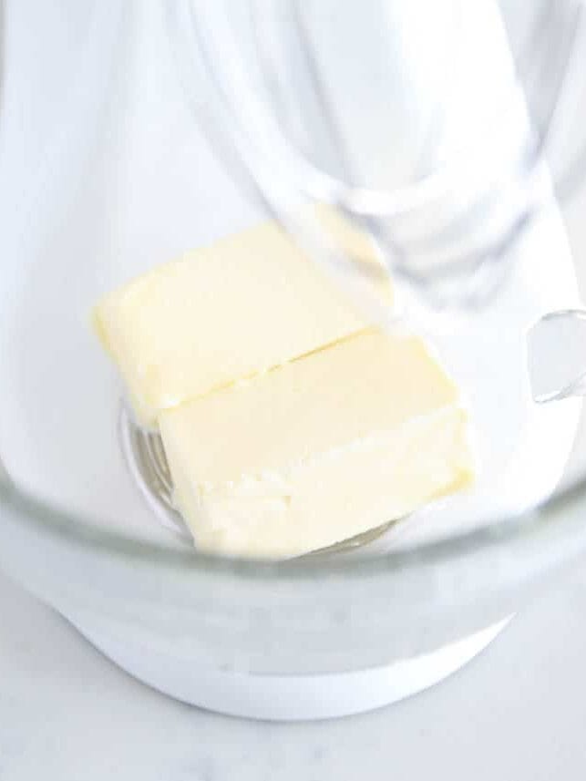 Butter in glass bowl.