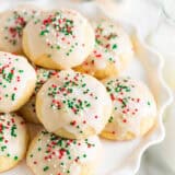 Italian Christmas cookies on a cake plate.