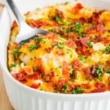 Mashed potato casserole with bacon on top.