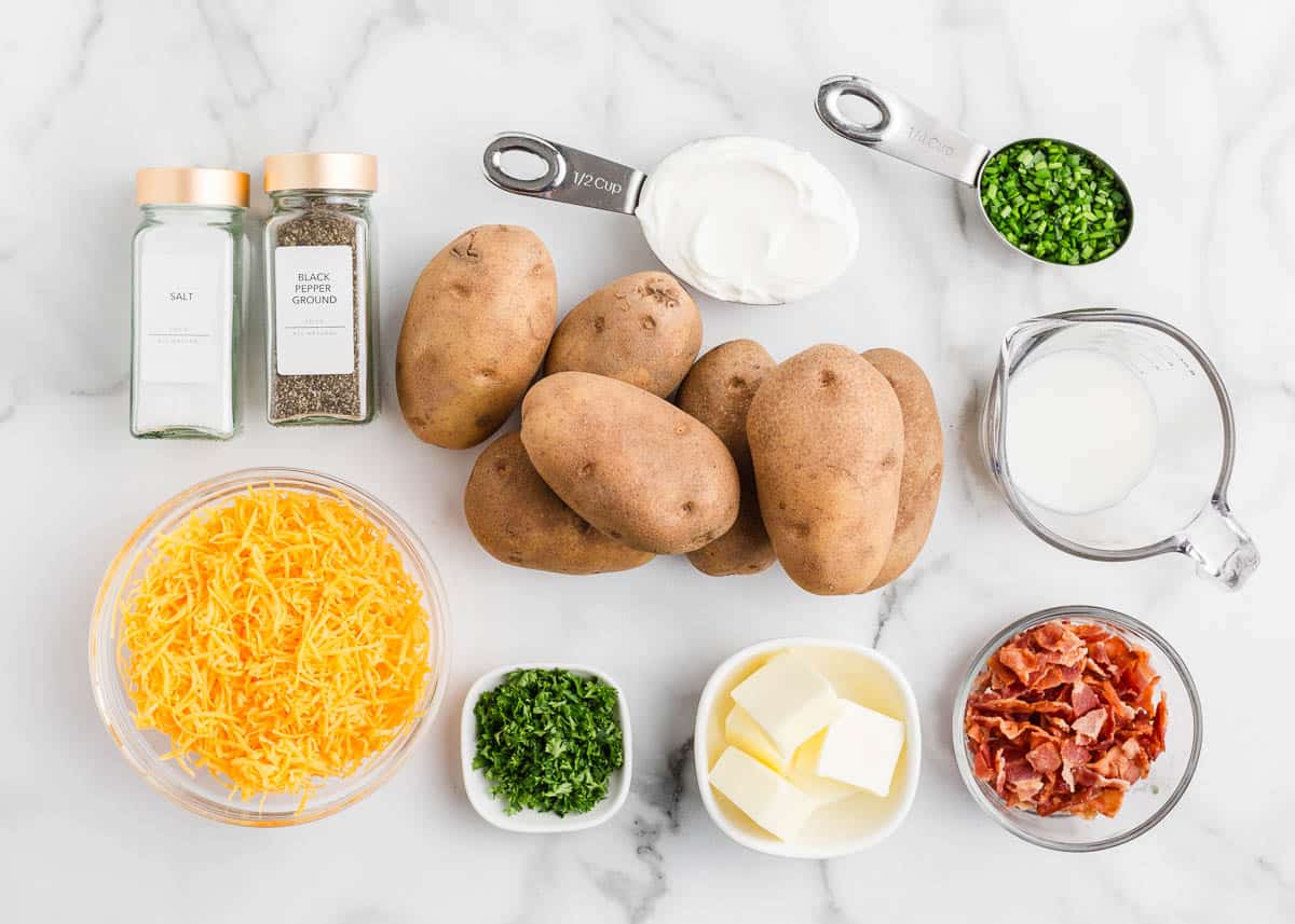 Mashed potato casserole ingredients on the counter.