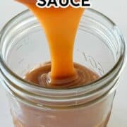 Caramel sauce being poured in a jar.