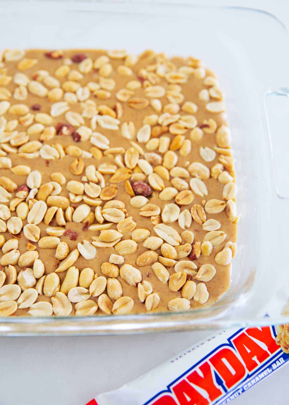 Homemade pay day candy bar in a pan.