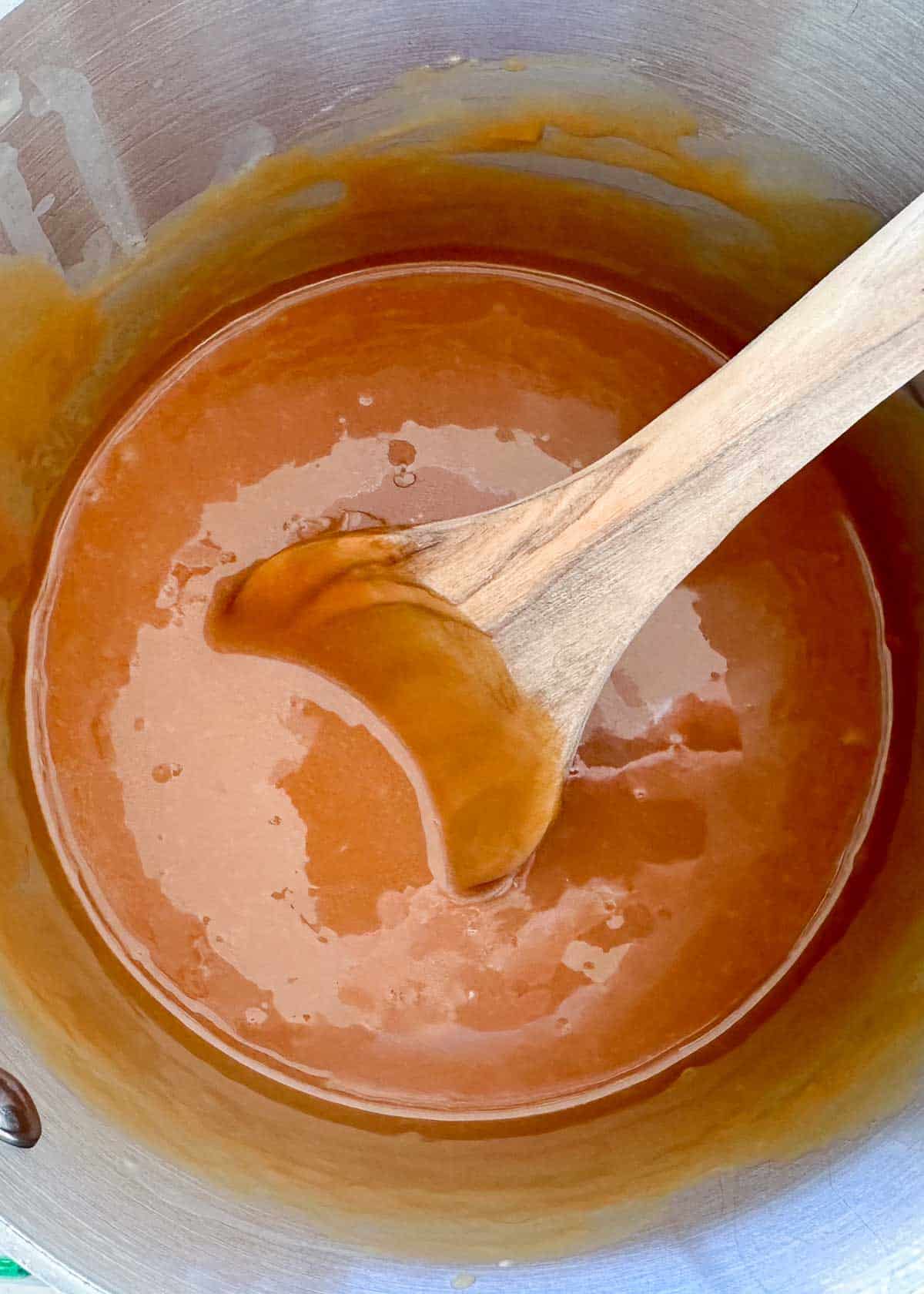 Caramel sauce in a pot.