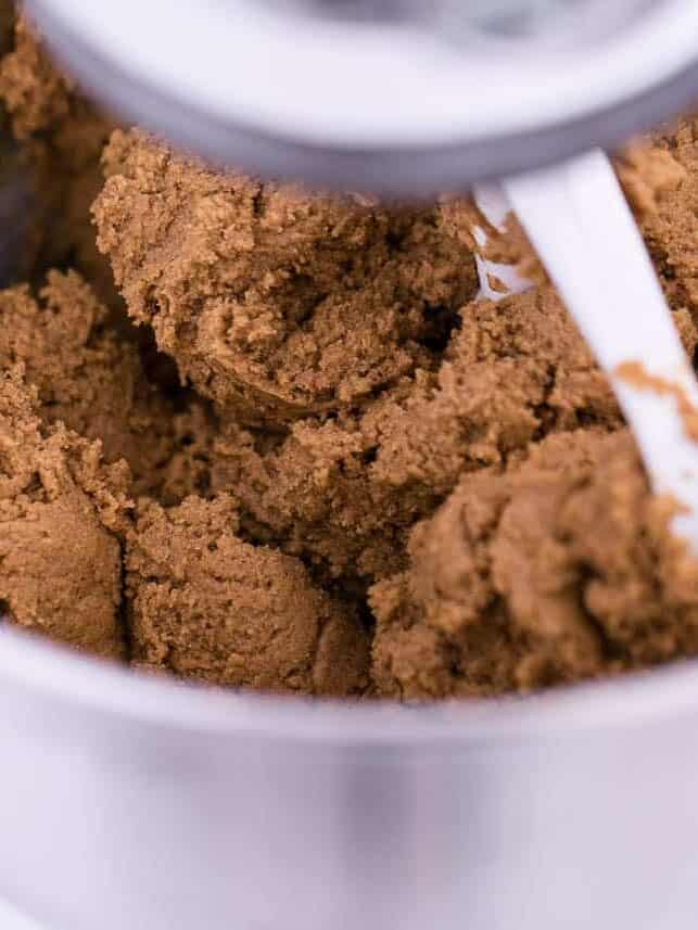 Ginger molasses cooking dough in a stand mixer.