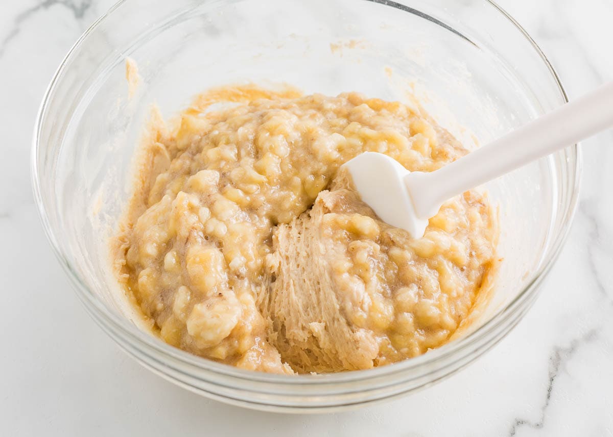 Mixing cinnamon roll banana bread.