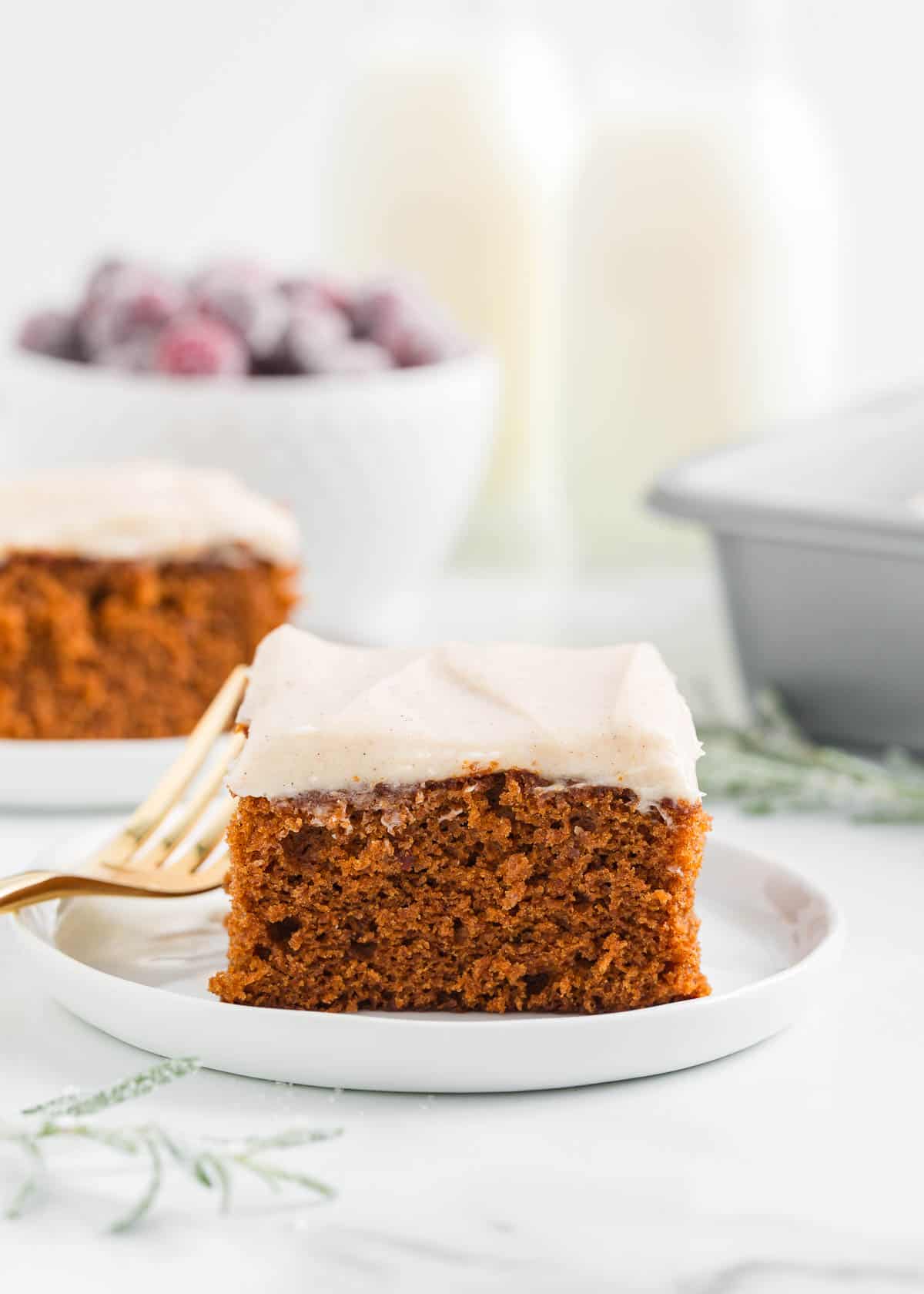 Slice of gingerbread cake on a plate.