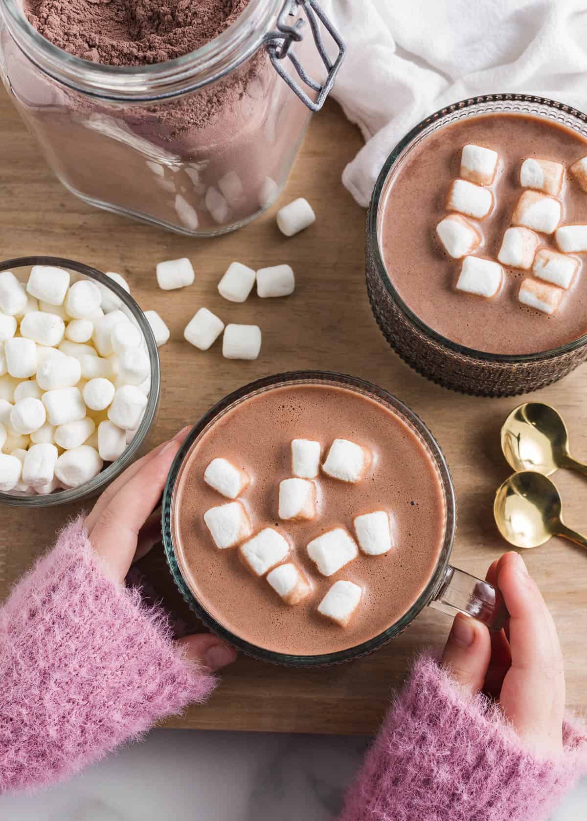 Mug of hot chocolate on board.