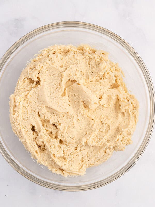 Christmas sugar cookie dough in a bowl.