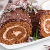 Yule log cake on a plate.