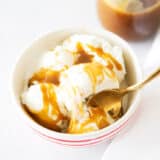 Butterscotch and ice cream in a bowl.