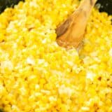 Creamed corn in a skillet.