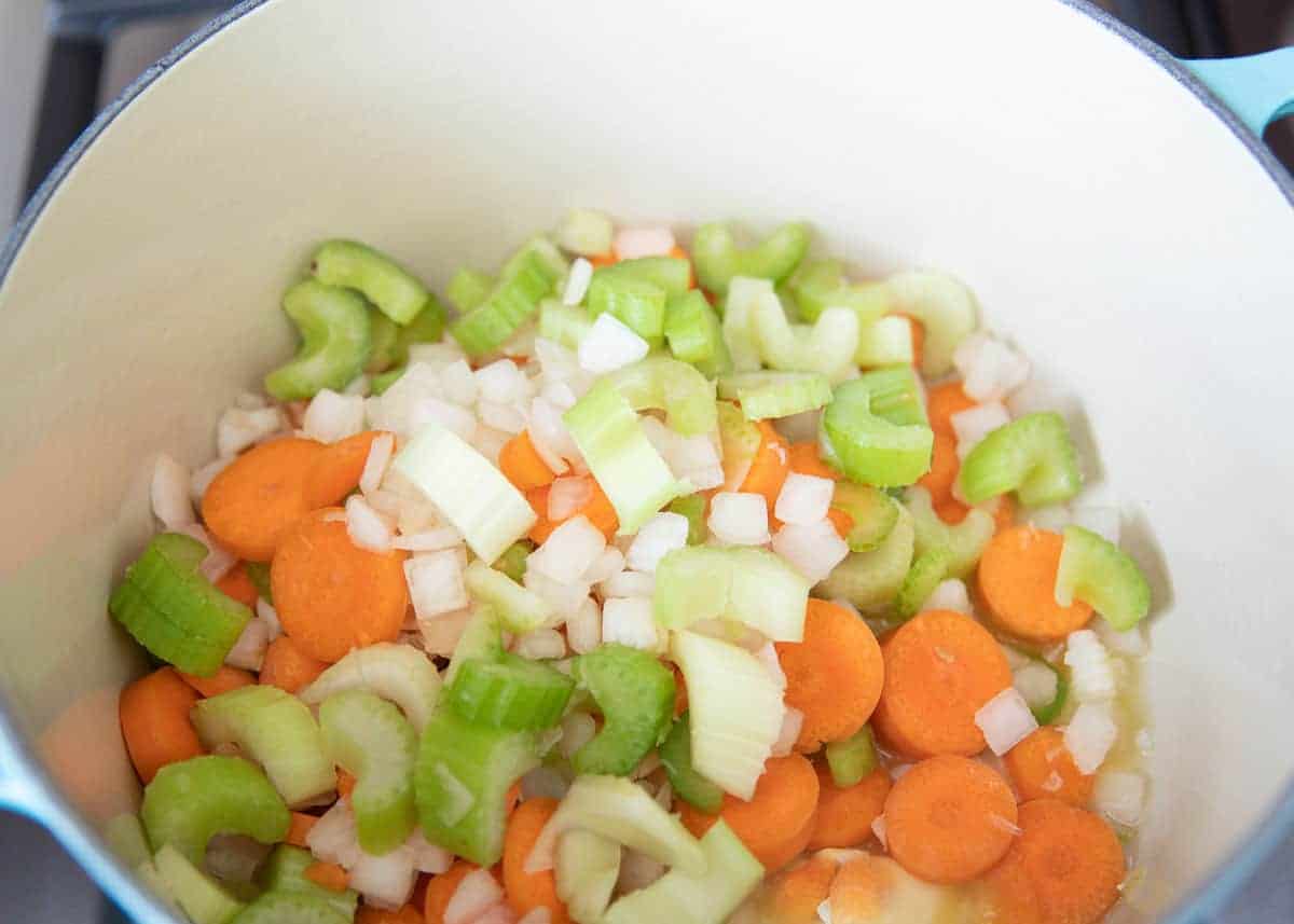 Veggies, onion and leftover turkey in a pot.