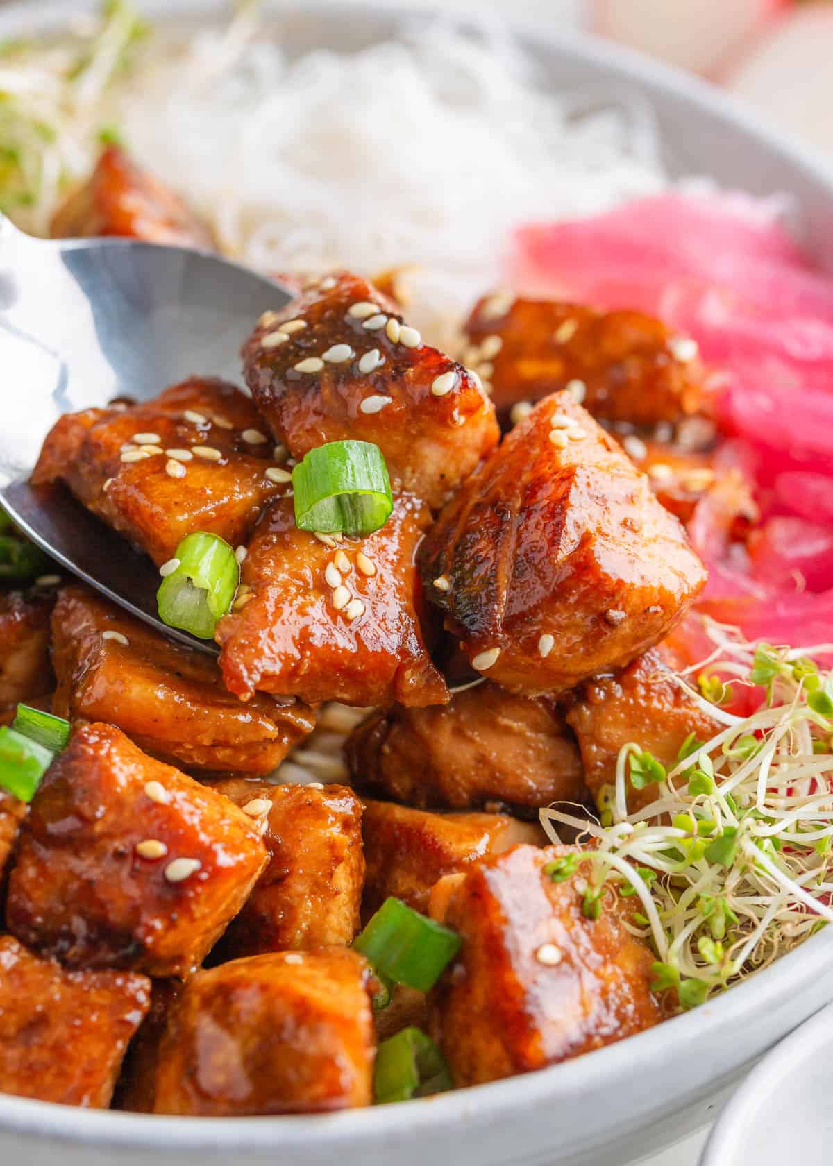 Salmon bites in a bowl.