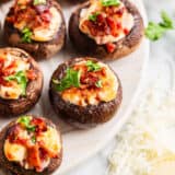 Stuffed mushrooms on a plate.