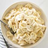 Chicken tortellini alfredo in a bowl.