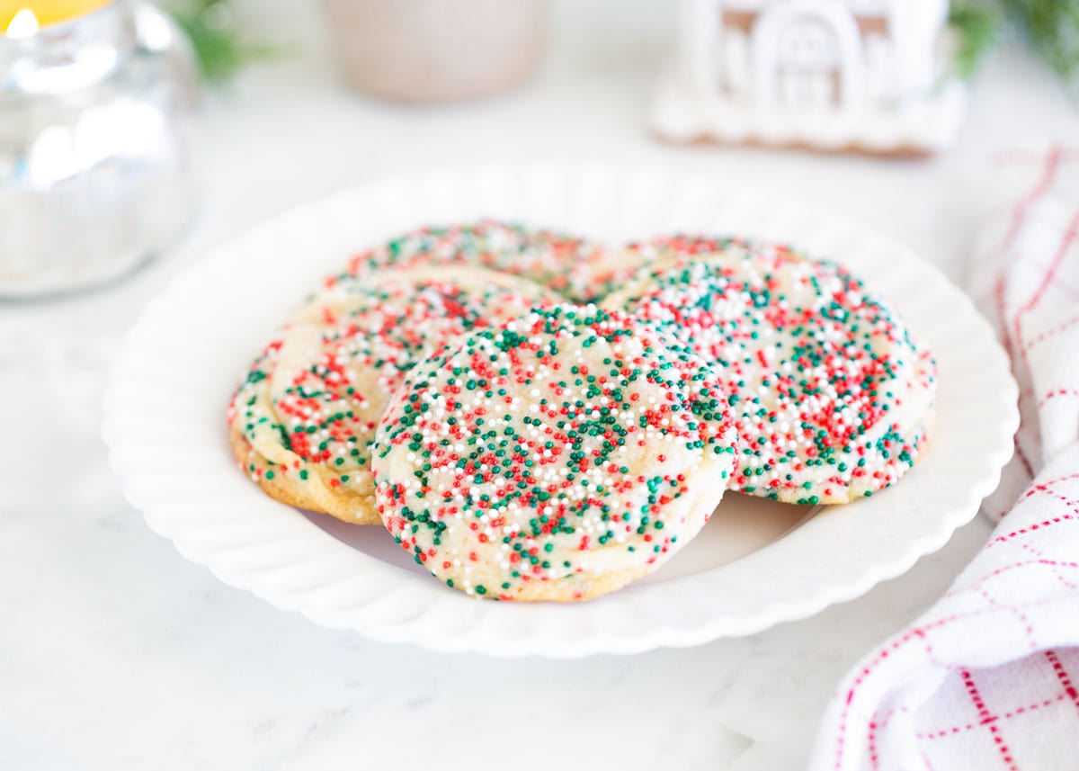 Drop sugar cookies on a a plate.